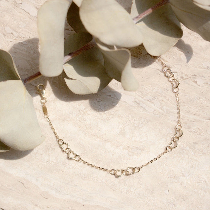 10K Yellow Gold Linked Hearts Bracelet GBJ-10-1132-GB