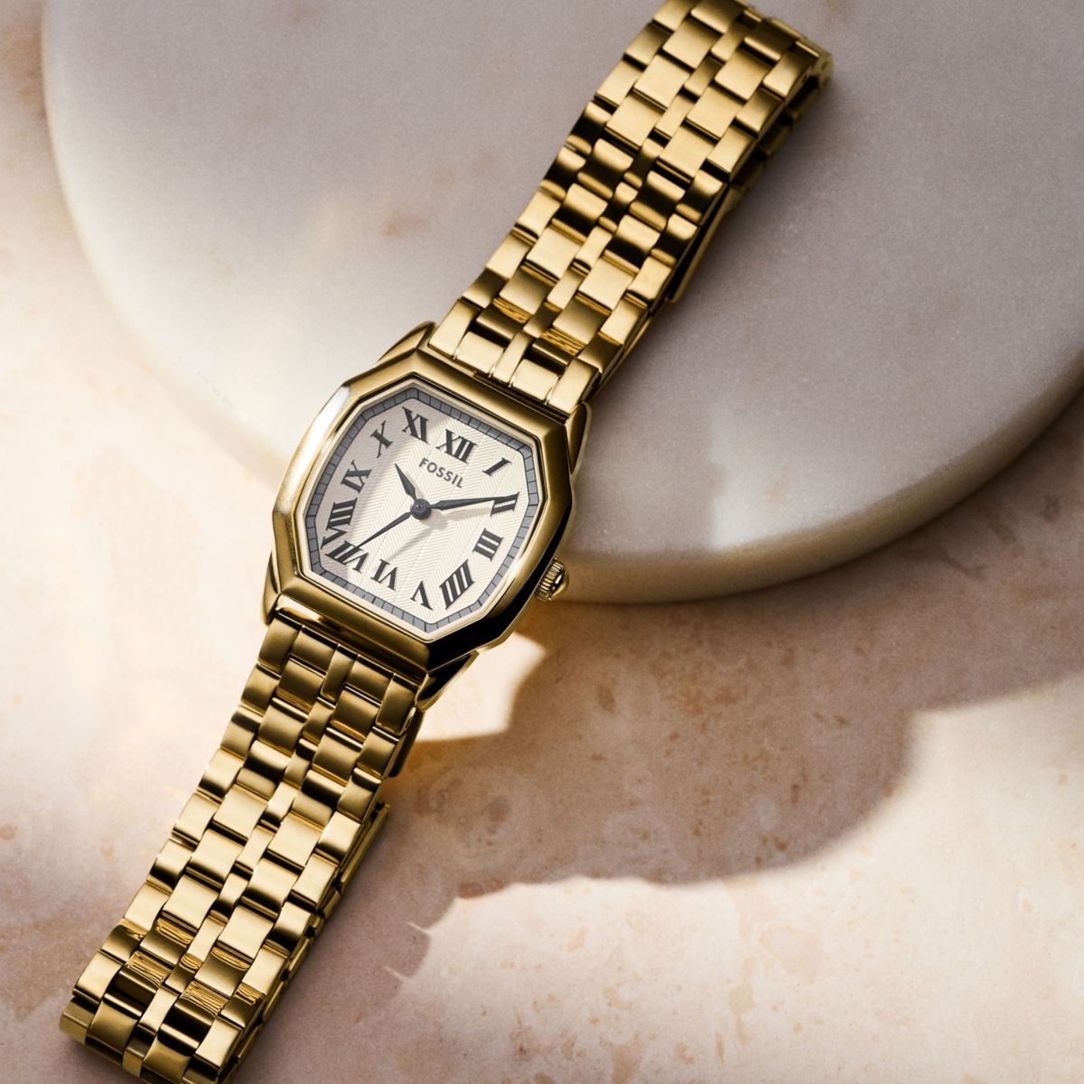 HARLOW THREE-HAND GOLD-TONE STAINLESS STEEL WATCH